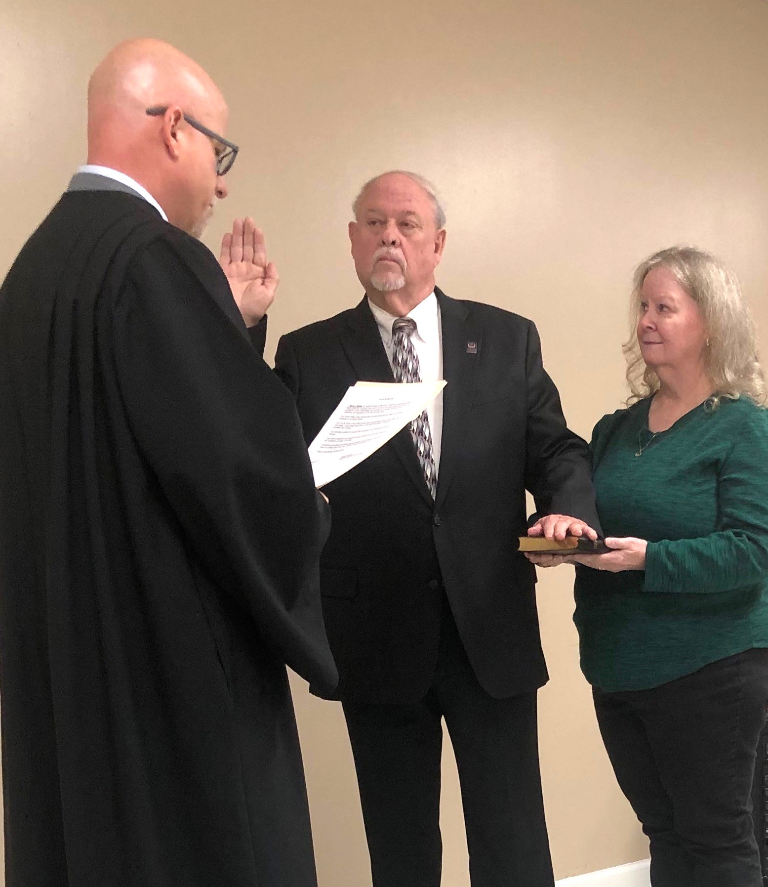 Swearing in Mayor David Keener as Penny Keener looks on