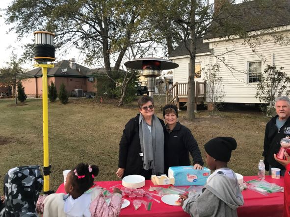 Cookie decorating at Tree Lighting - Susan Roper at left, Robbie Groves at right - Nov. 18, 2022